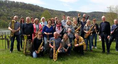 Gruppenfoto eines symphonischen Blasorchesters
