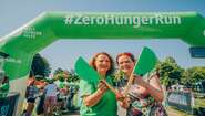 Oberbürgermeisterin Katja Dörner beim Zero Hunger Run in einem grünen T-Shirt.